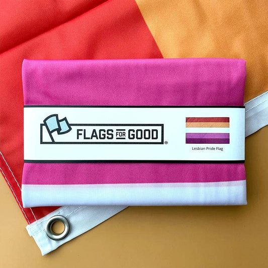 Pink and white striped flag with 'Flags for Good' label on a colorful background