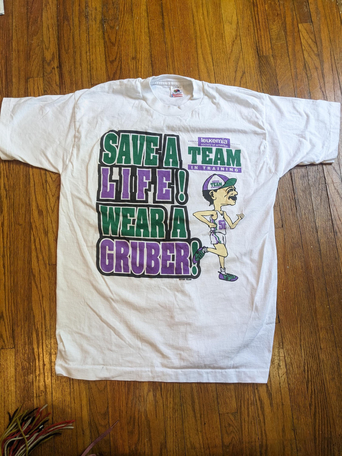 Deadstock 90s Y2k t-shirt Save A Life Wear a Gruber Leukemia t-shirt - House of Dow