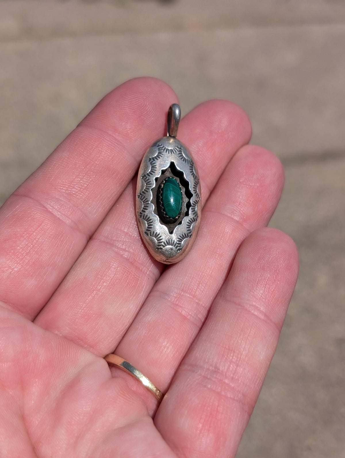 Vintage southwestern shadowbox pendant with Malachite center. Stamped with the Hallmark letter K