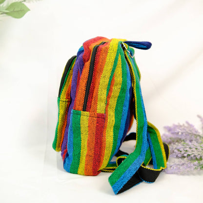 Colorful striped backpack on a white background with lavender flowers.