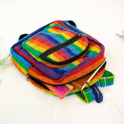 Colorful striped bag with a black zipper on a white background