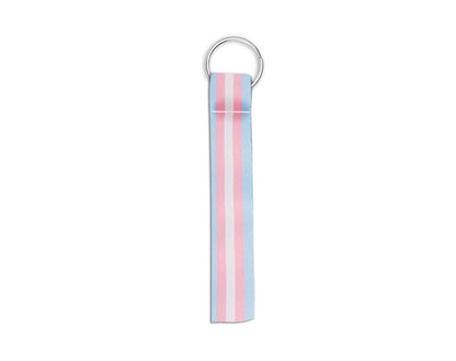 A fabric keychain strap with vertical pink, white, and light blue stripes, attached to a silver metal split ring, shown on a plain white background.