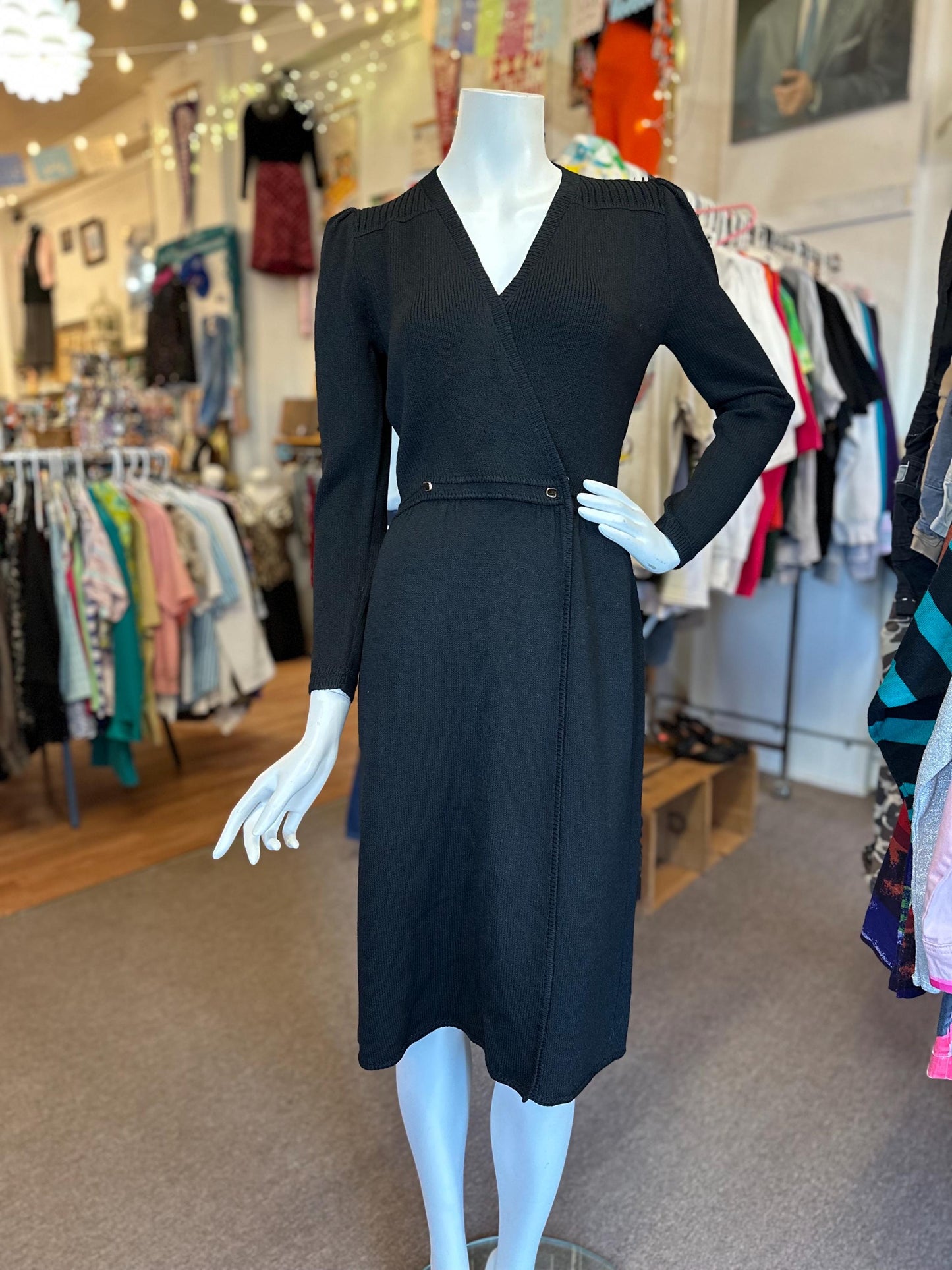 Black dress on a mannequin in a clothing store