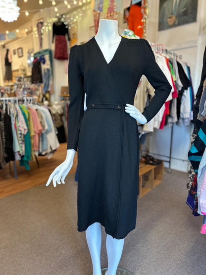 Black dress on a mannequin in a clothing store