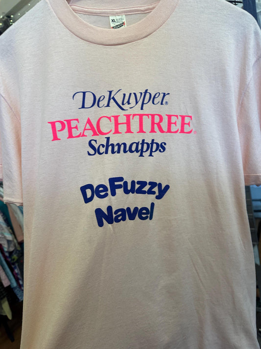 White t-shirt with colorful text 'DeKuyper Peachtree Schnapps DeFuzzy Navel' on a plain background.