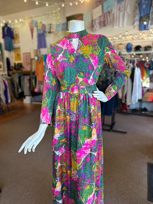 Colorful floral dress on a mannequin in a store setting