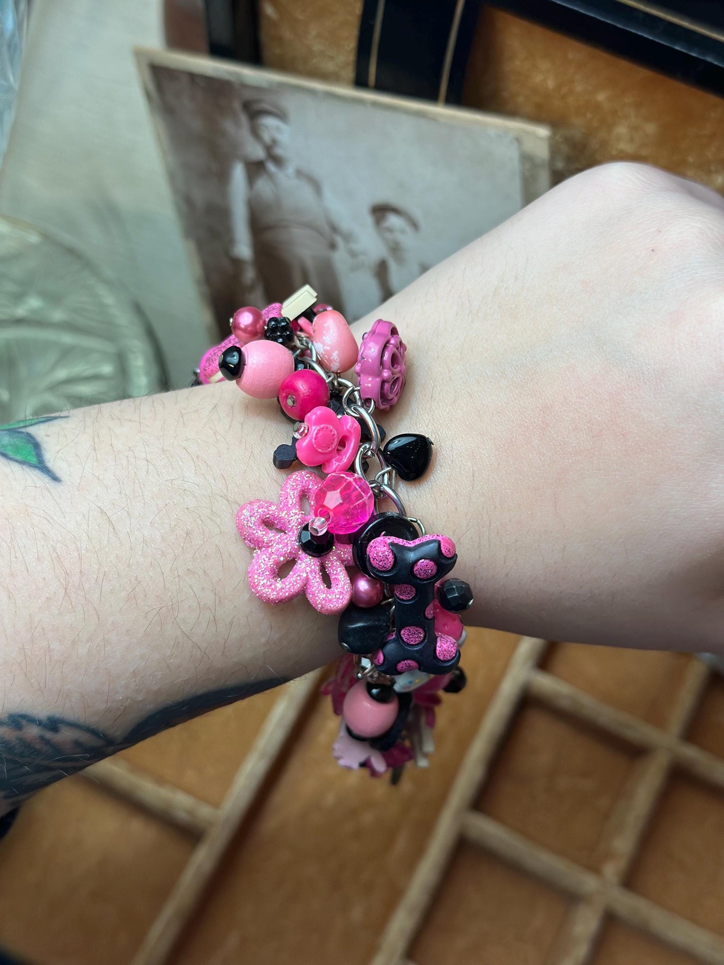 Vintage 1980's Inspired Overloaded Junk Bracelet with Plastic Charms Pink and Black Betsy Johnson Barbie Inspired.
